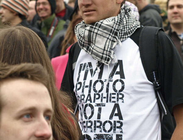 London street photographers stopped while taking images