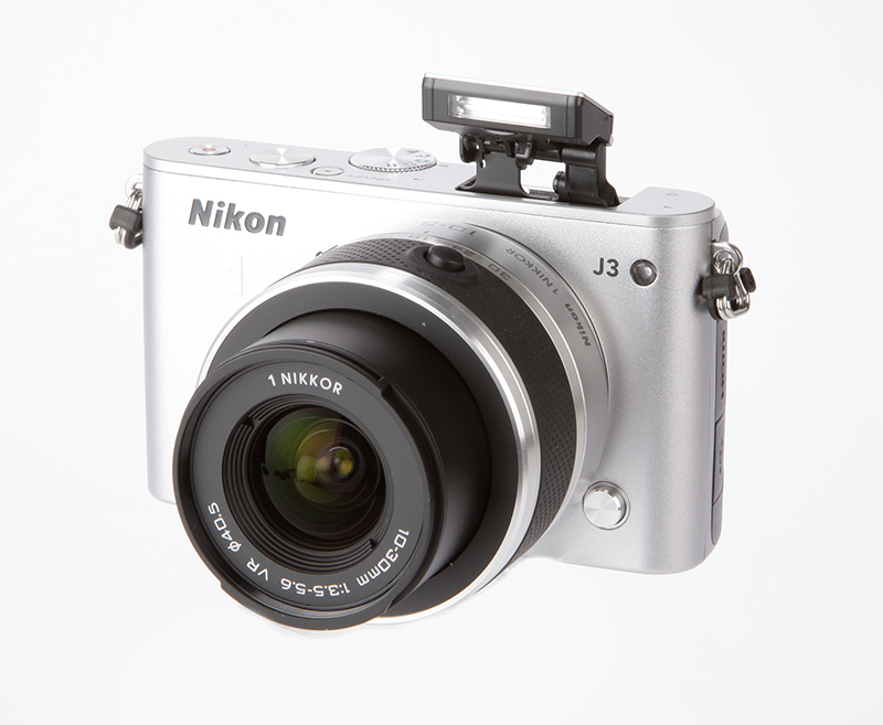 Nikon 1 J3 Review - front w/ flash