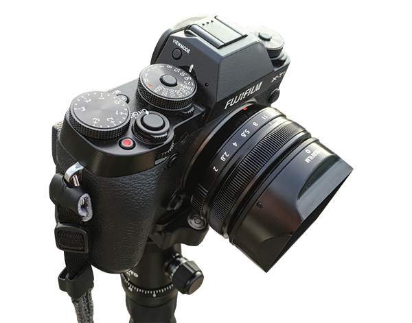 The 18mm f/2 lens mounted on a Fujifilm X-T1 camera during a landscape shoot