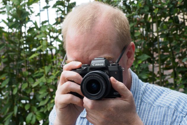 Canon EOS M5 in-hand
