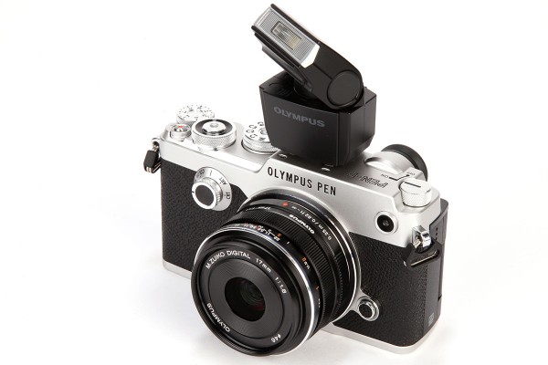 Olympus's clip-on FL-LM3 flash unit has a bounce and swivel head for better lighting
