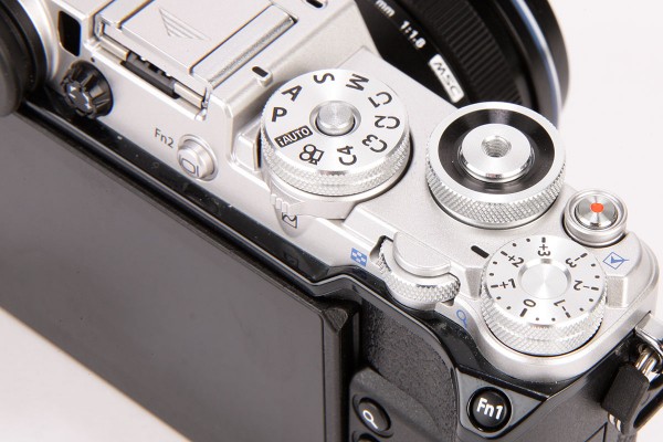 In a first for Olympus, the PEN-F sports an exposure compensation dial